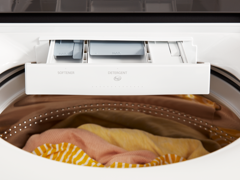 Open detergent dispenser on a Whirlpool® Washing Machine