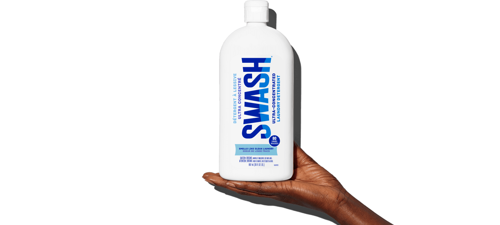Swash® Laundry Detergent Smells Like Clean Laundry being held in palm of hand
